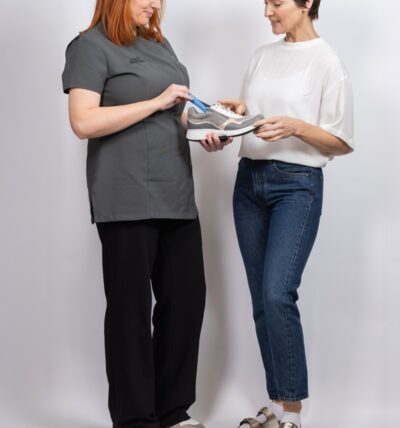 A lady being assisted at Footsolutions